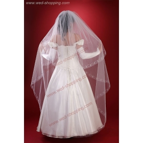 Kirjailtu reuna huntu