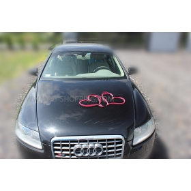 Kaksi rottinki sydäntä häät koristeluun