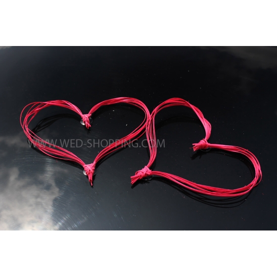 Kaksi rottinki sydäntä häät koristeluun